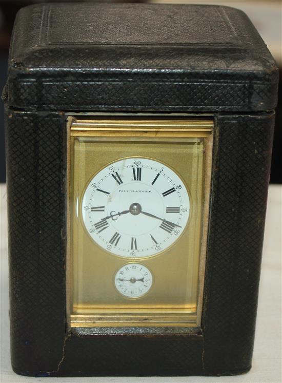 A 19th century gilt brass carriage alarum clock, 5in., with travelling case